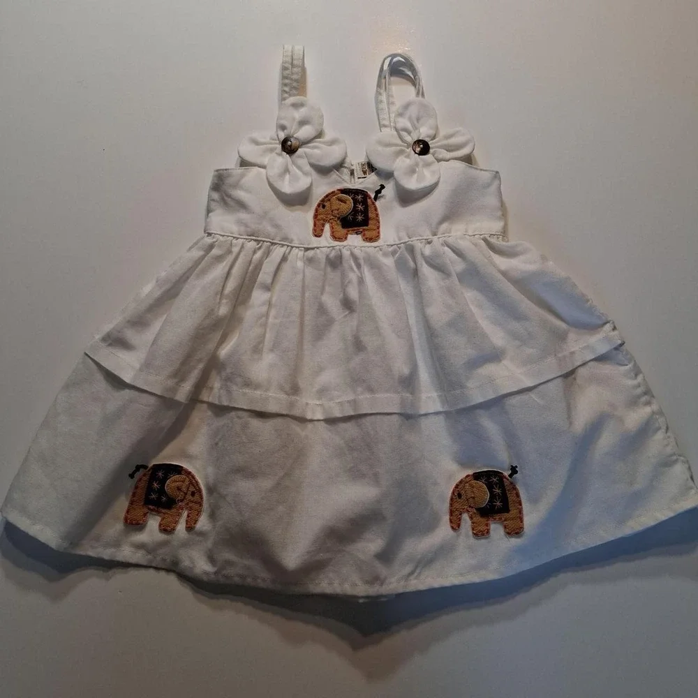 White baby‎ dress with elephant applique and bow detail